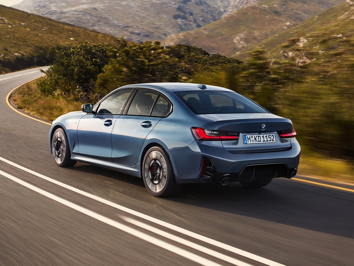 2025 BMW 3 Series Blue Rear Quarter View Action European model