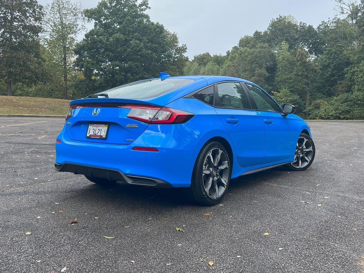 2025 Honda Civic Sport Touring Hybrid Boost Blue Pearl Rear Quarter View