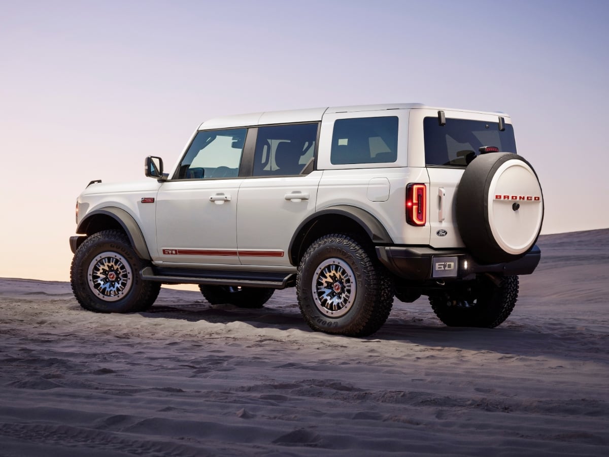 2026 Ford Bronco 60th Anniversary Package Wimbledon White Rear Quarter View Off-Road