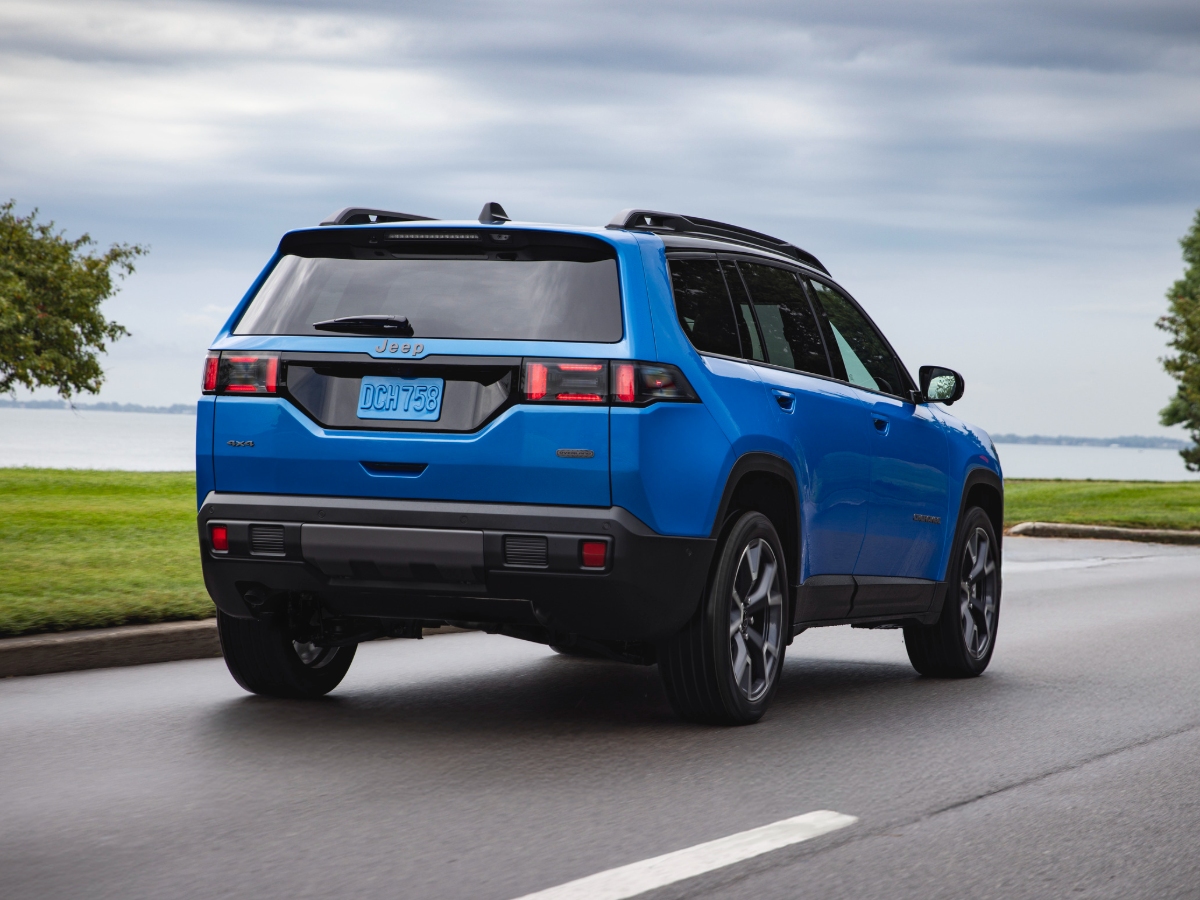 2026 Jeep Cherokee Overland Blue Rear Quarter View Action