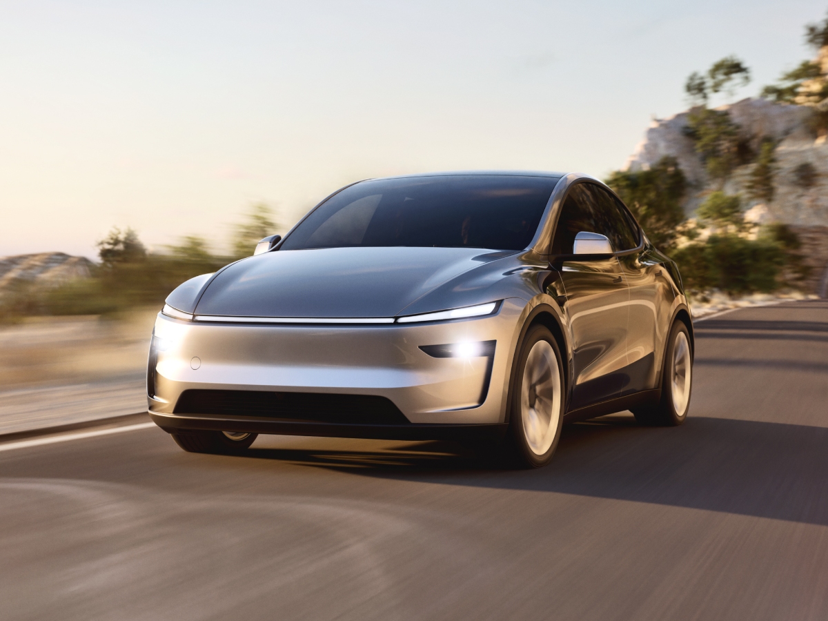2026 Tesla Model Y Silver Front Quarter View Action