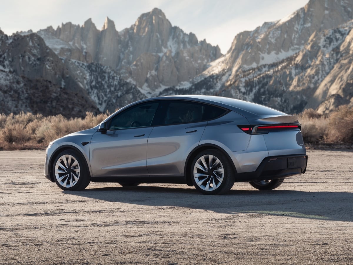2026 Tesla Model Y Silver Rear Quarter View Off-Road