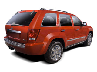 2010 Jeep Grand Cherokee Pictures Grand Cherokee Utility 4D Laredo 2WD photos side rear view