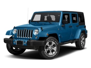 2016 Jeep Wrangler Unlimited Pictures Wrangler Unlimited Utility 4D Unlimited Sahara 4WD V6 photos side front view