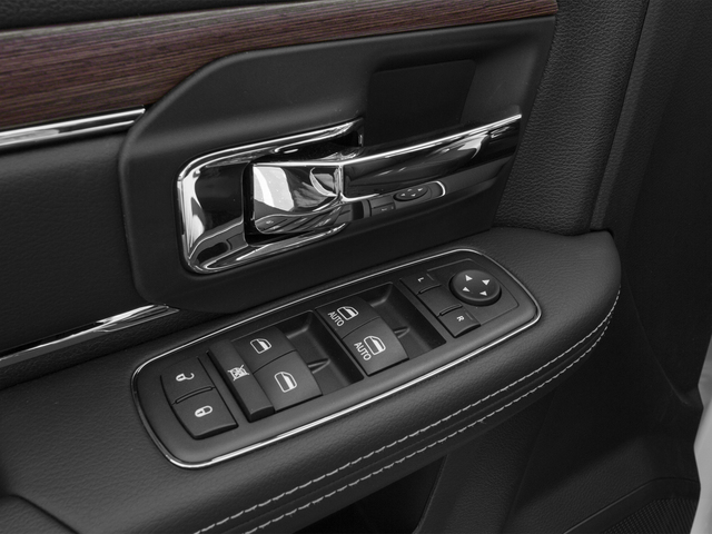 2015 Ram 3500 Prices and Values Mega Cab Laramie 4WD driver's side interior controls