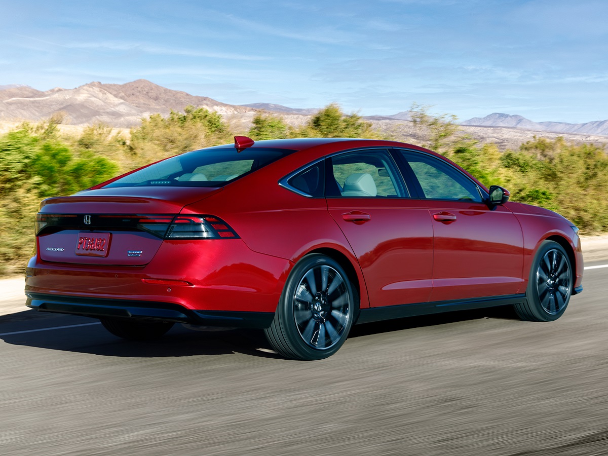 2023 Honda Accord Touring Radiant Red Metallic Rear Quarter View Action