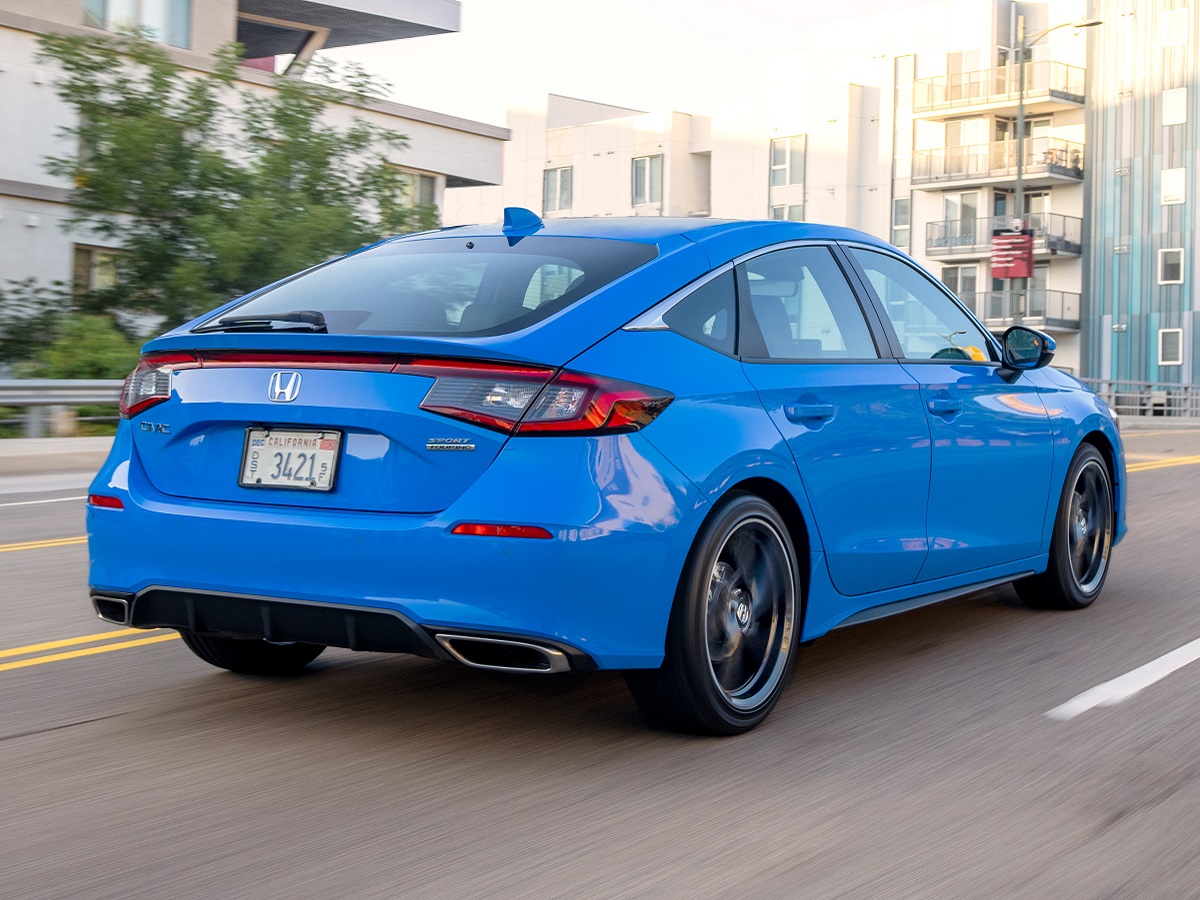 2023 Honda Civic Hatchback Blue Rear Quarter View Action