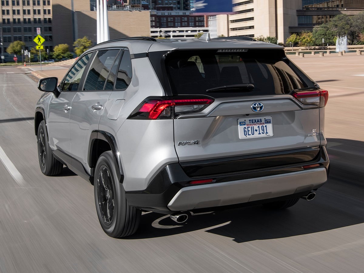 2023 Toyota RAV4 SE Hybrid Silver Rear Quarter View Action